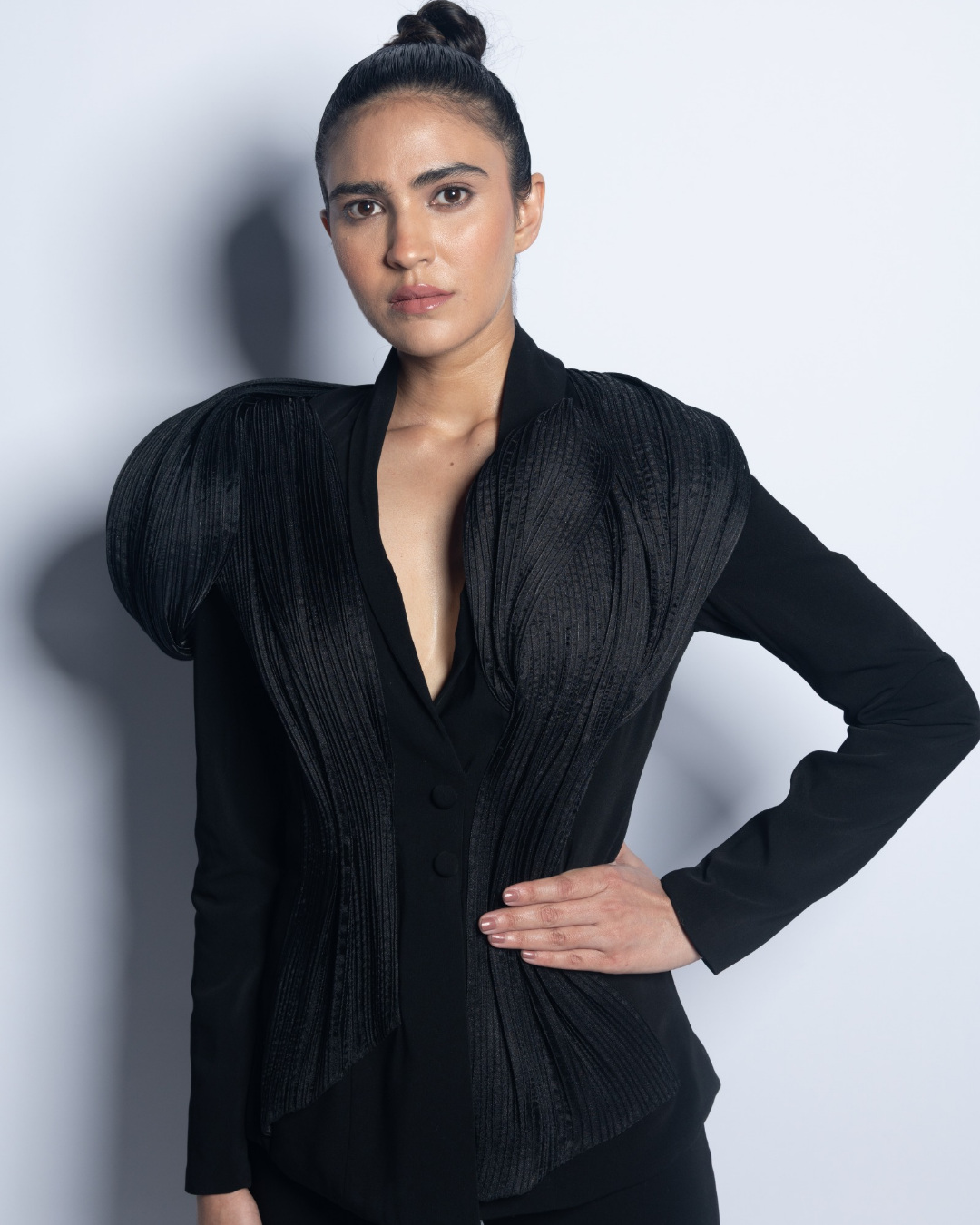 Sofia in black power shoulder pant suit